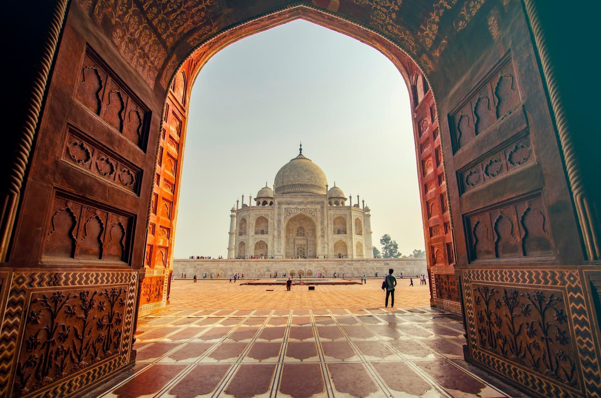 The Taj Mahal seen through the arch of its great gateway at dawn