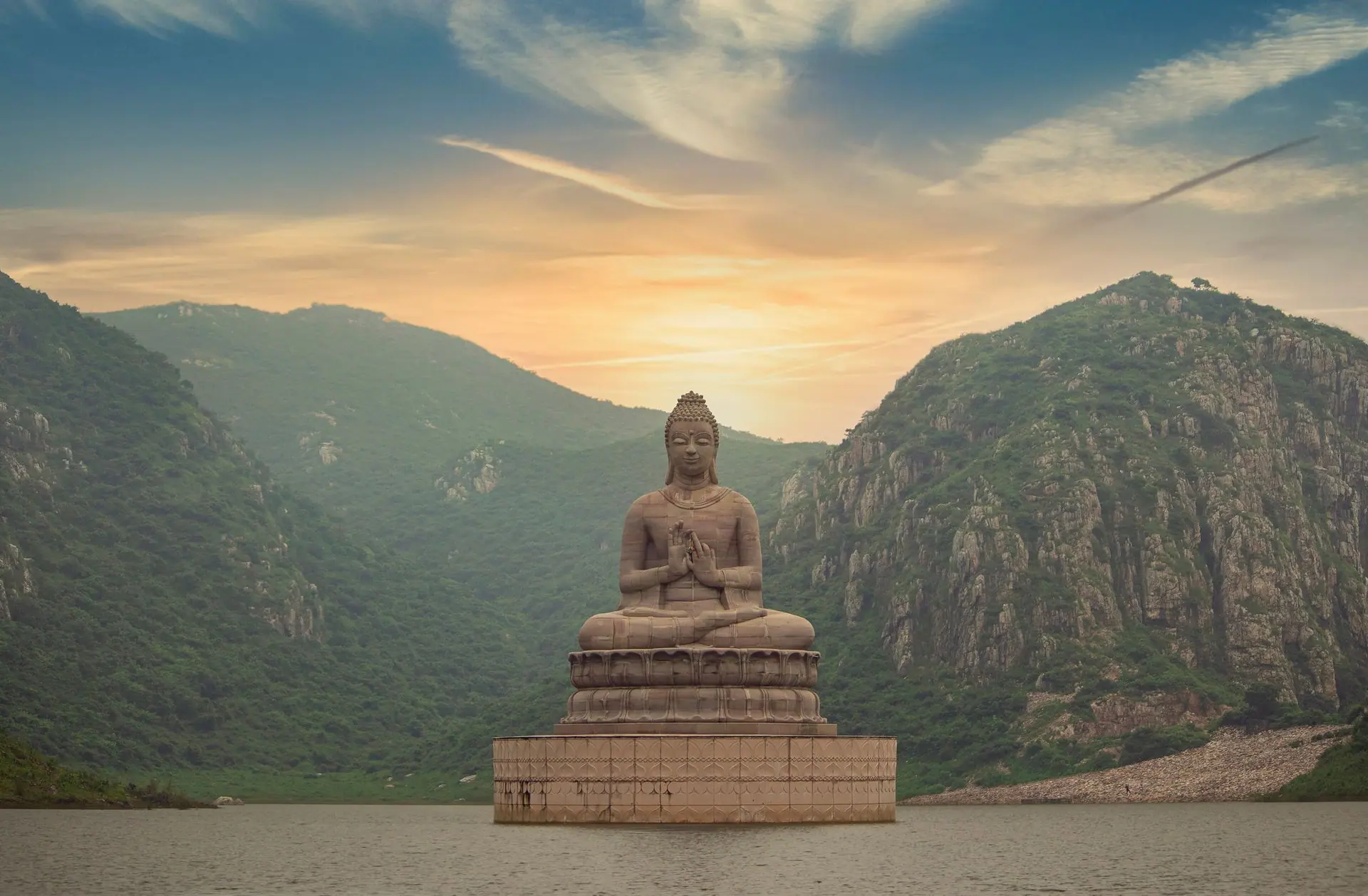Majestic Buddha statue at Ghora Katora Lake, Rajgir during twilight
