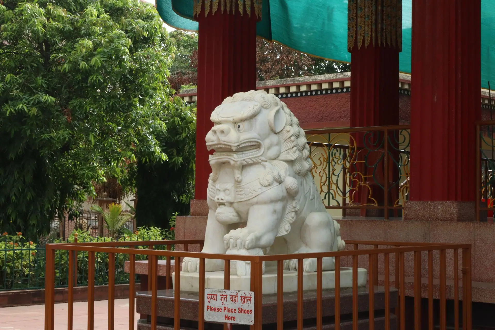 Elegant white stone statue at a temple in Bodh Gaya, Bihar, India