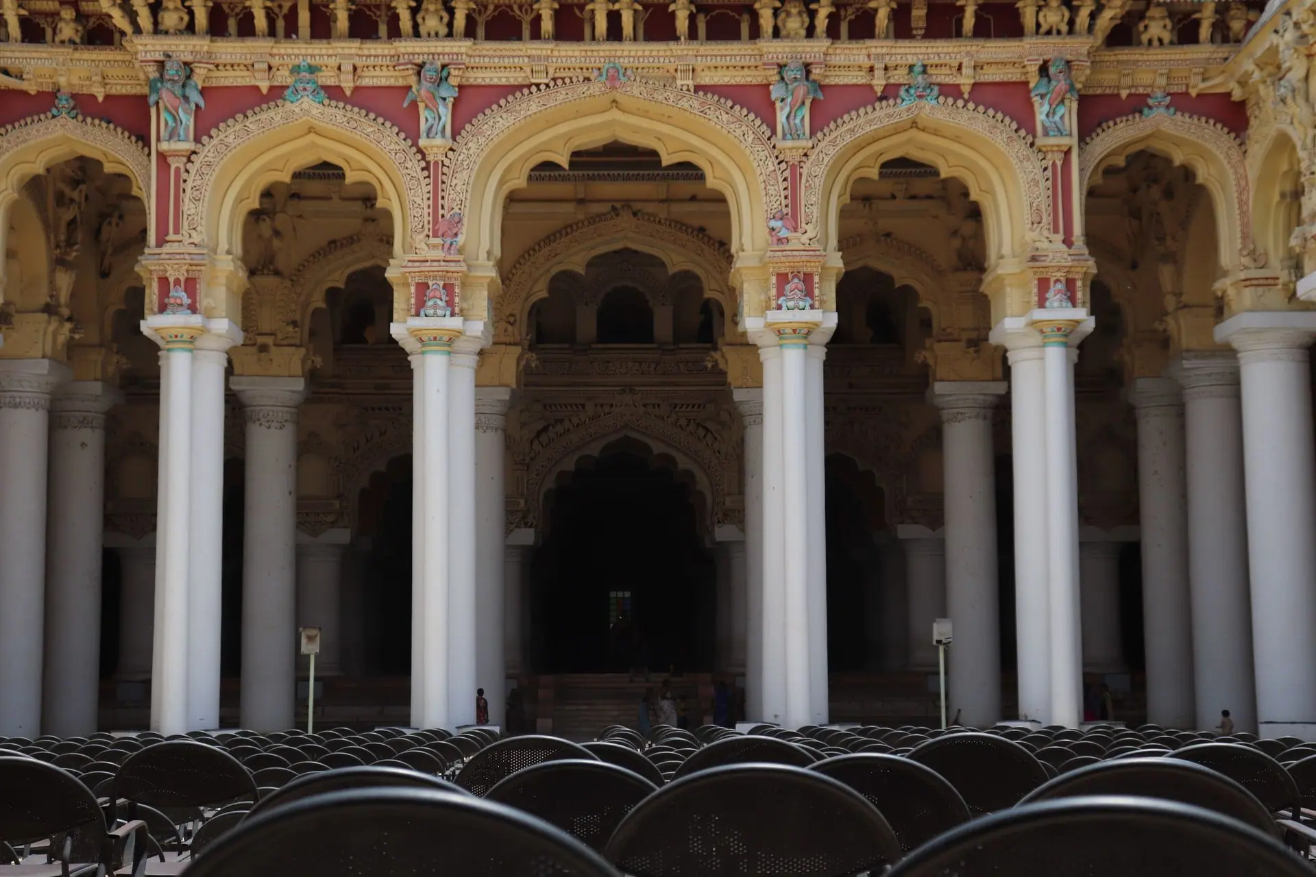 Architectural detail of Thirumalai Nayakkar Palace in Madurai, Tamil Nadu showcasing grand arches and columns