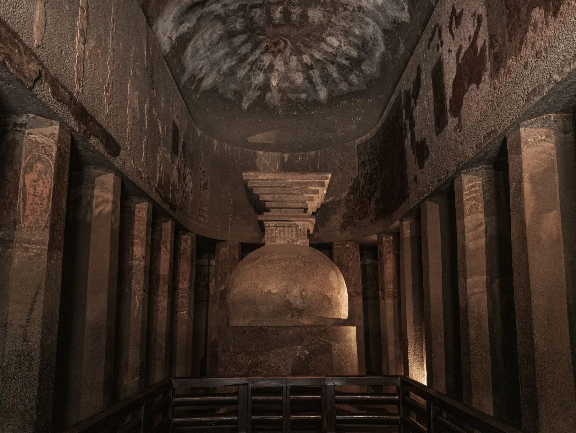 Explore the ancient Ajanta Cave in Maharashtra, India featuring a historic stupa