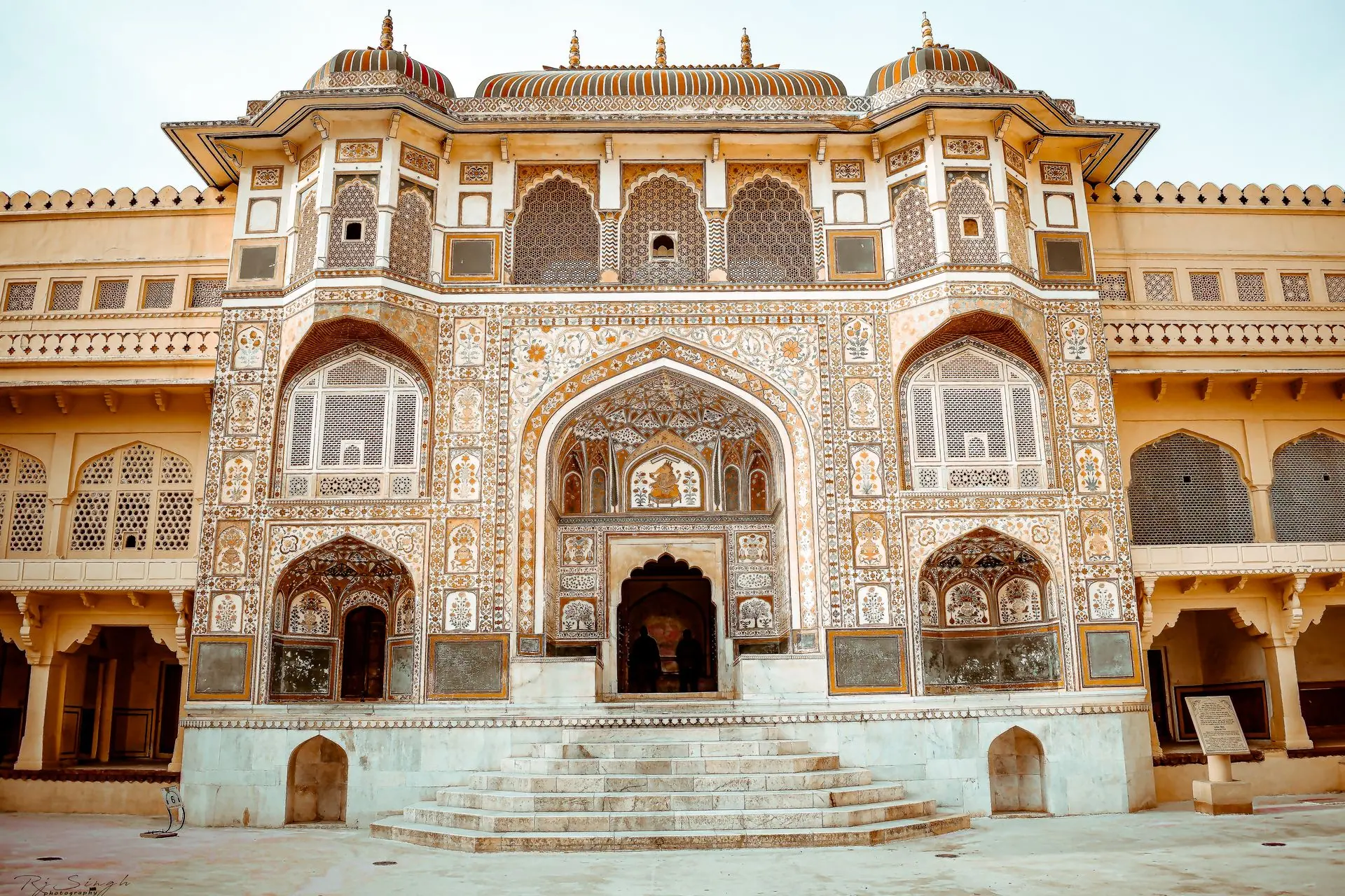 Ornate entrance of Amber Fort showcasing intricate architectural design and craftsmanship