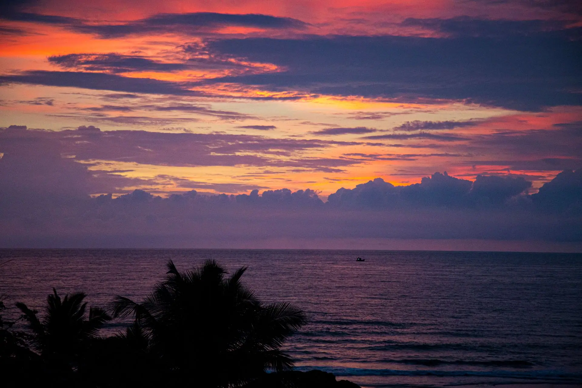 Serene sunset view over the Arabian Sea from Goa, India with vibrant sky colors