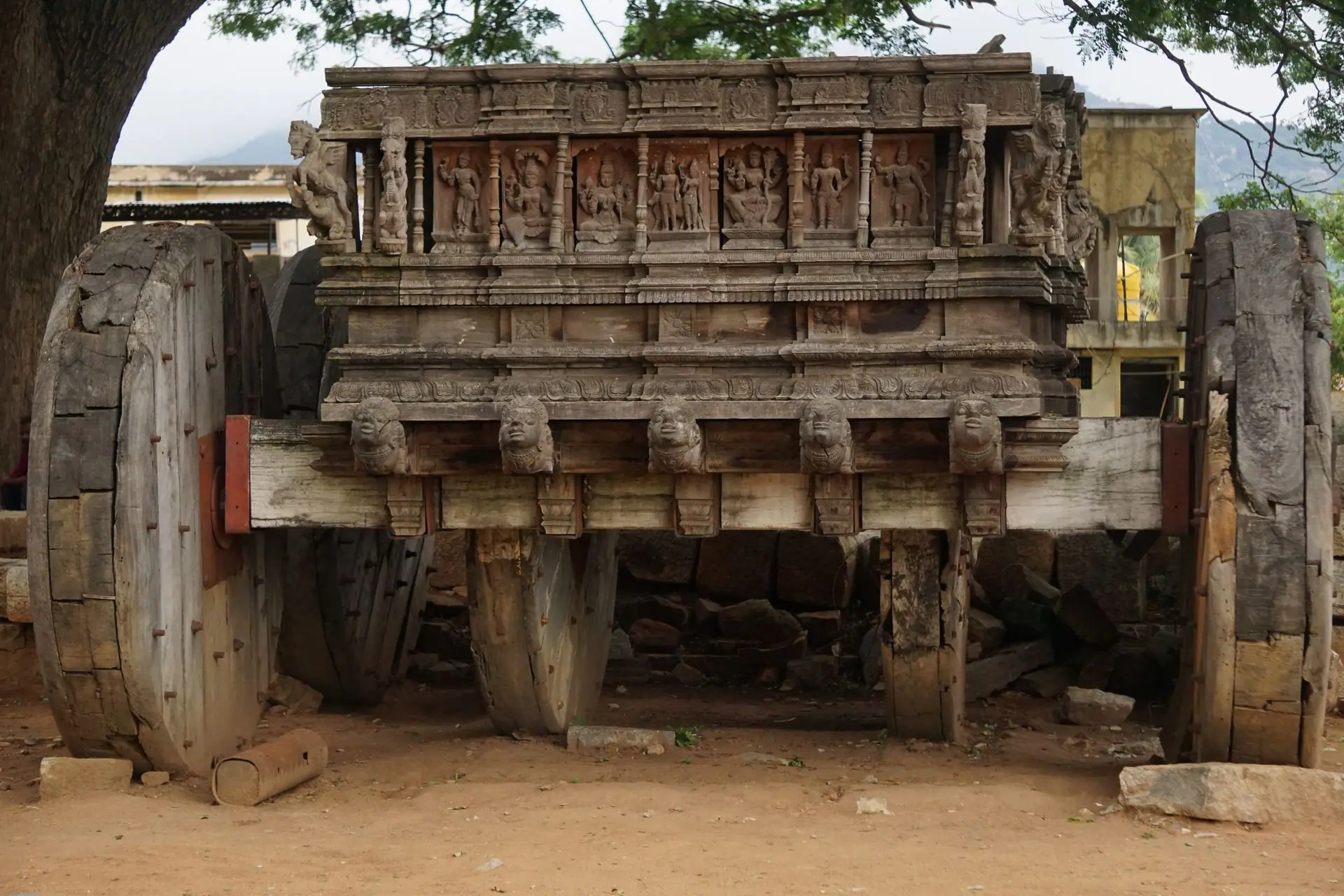 Intricate ancient stone chariot located in Hampi, India, showcasing remarkable architectural details
