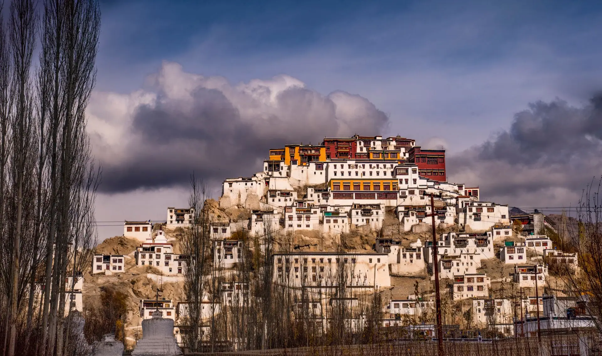 Explore the breathtaking Thiksey Monastery in Ladakh, nestled on a scenic mountainside range
