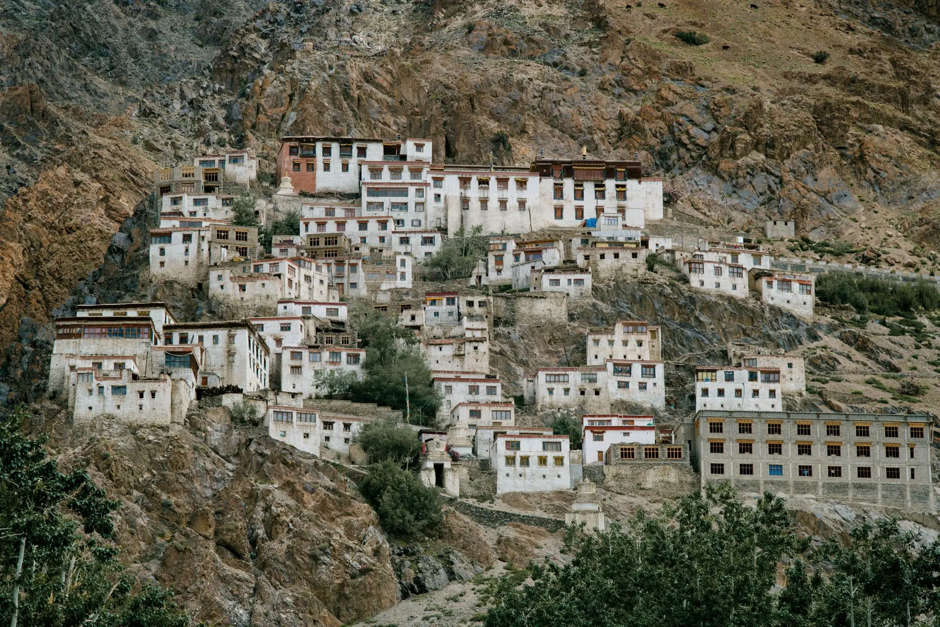 Picturesque scenery of aged Lingshed Gompa Tibetan Buddhist monastery located on slope of rocky mountain in Ladakh