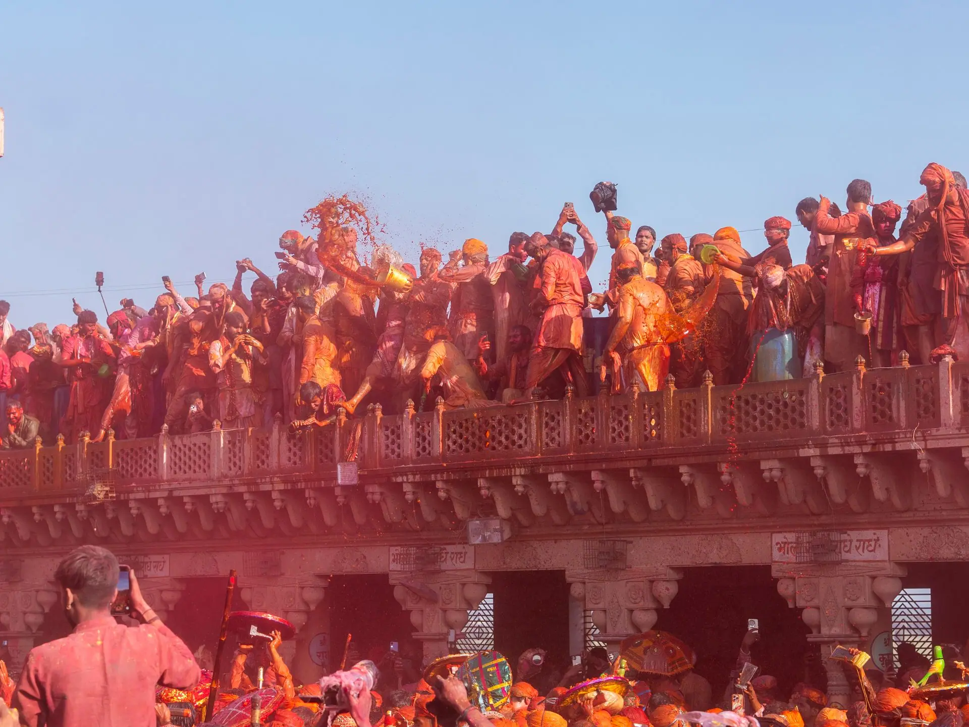Crowds celebrate Holi with vibrant colors at Nandgaon temple in India