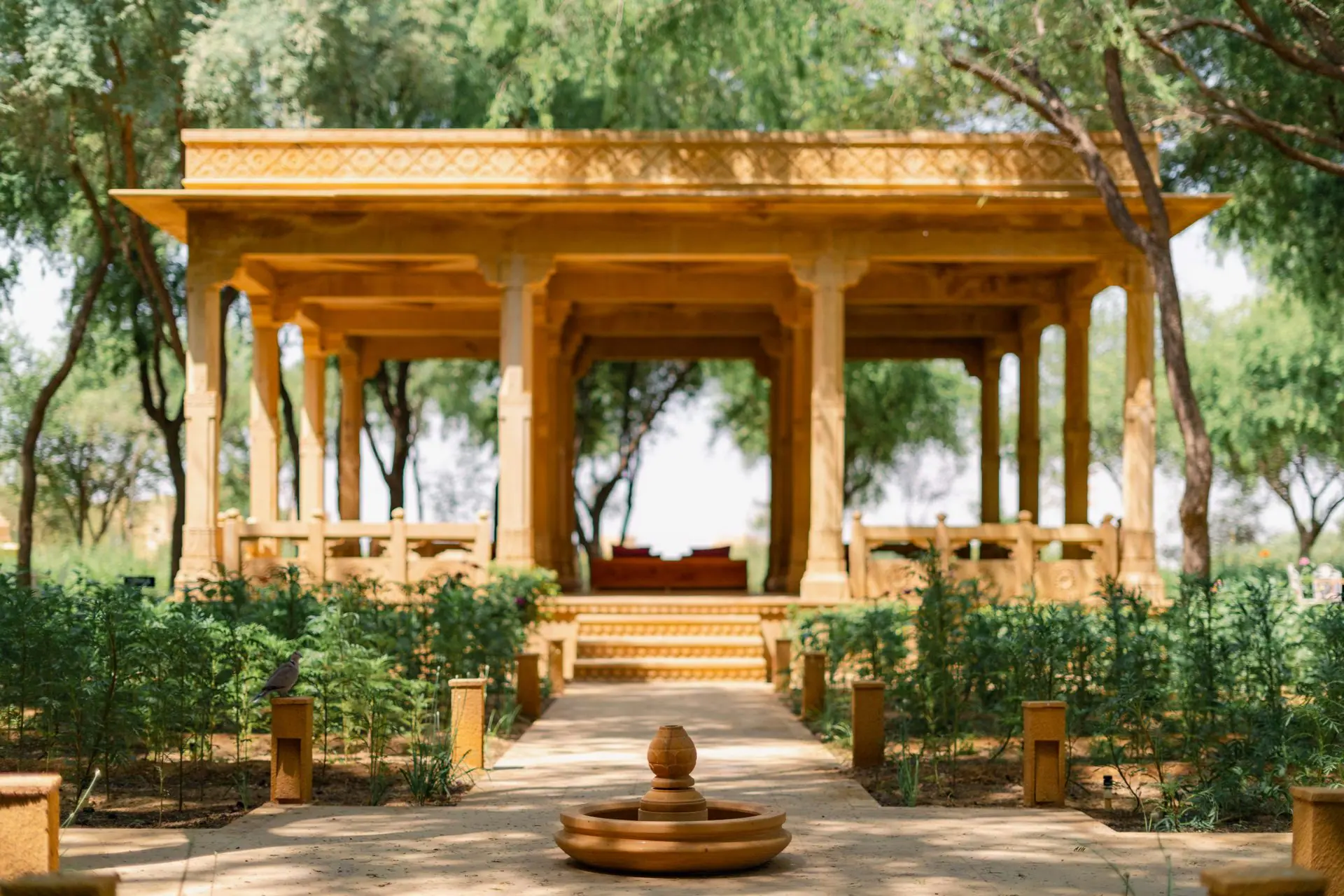 Explore the serene traditional courtyard at Suryagarh Hotel, Jaisalmer, India. Ideal for cultural experiences