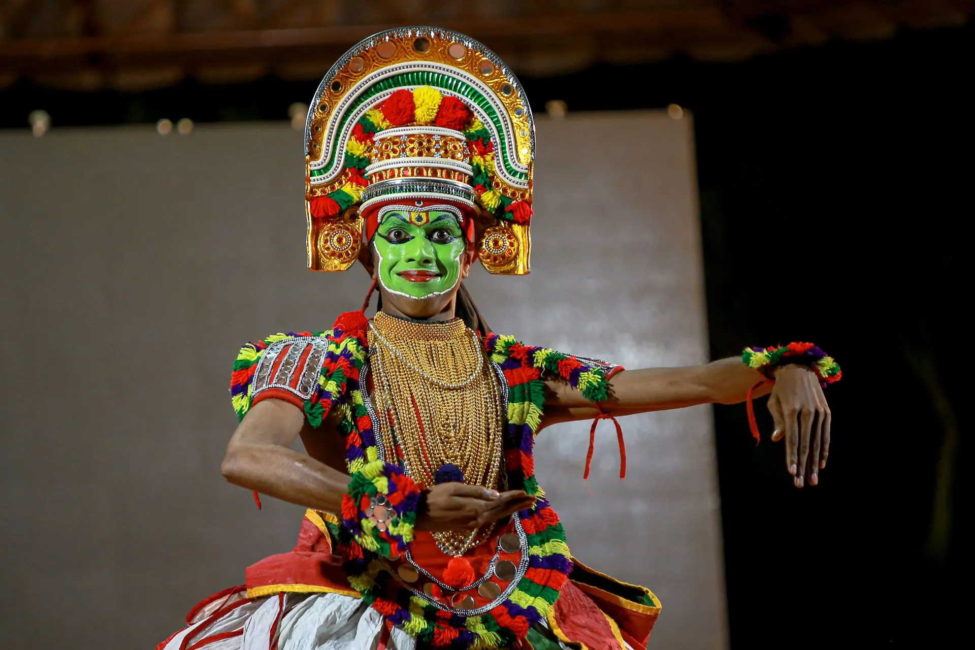 Vibrant Kathakali dancer in traditional costume performing in Kerala, India