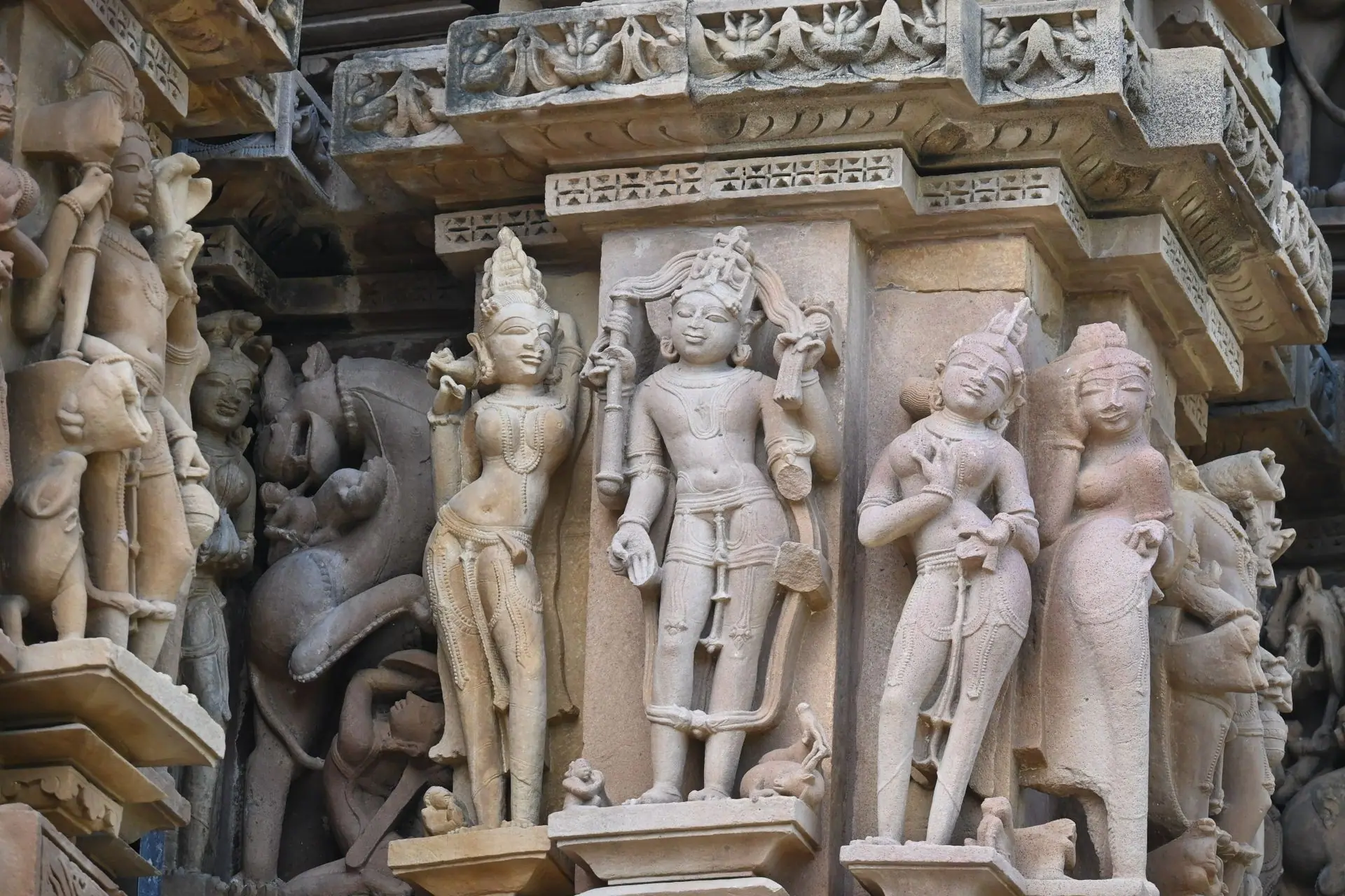 Close-up view of detailed stone carvings at a historic temple in Khajuraho, India