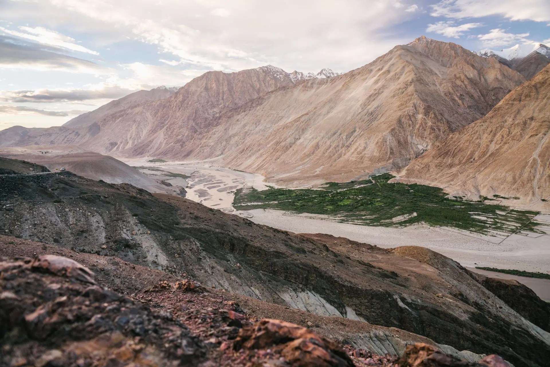 Breathtaking view of Nubra Valley's mountains and lush greenery in Ladakh, India