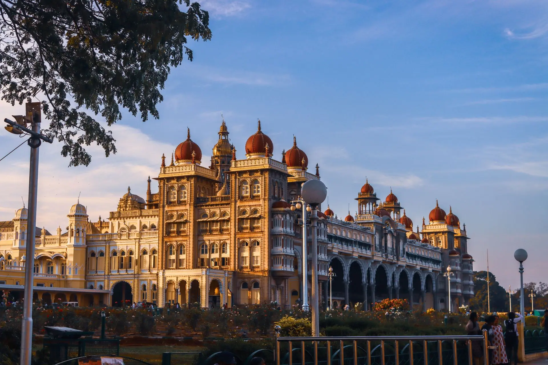 A breathtaking view of Mysore Palace, an iconic landmark in India, captured with architectural grandeur against a clear blue sky
