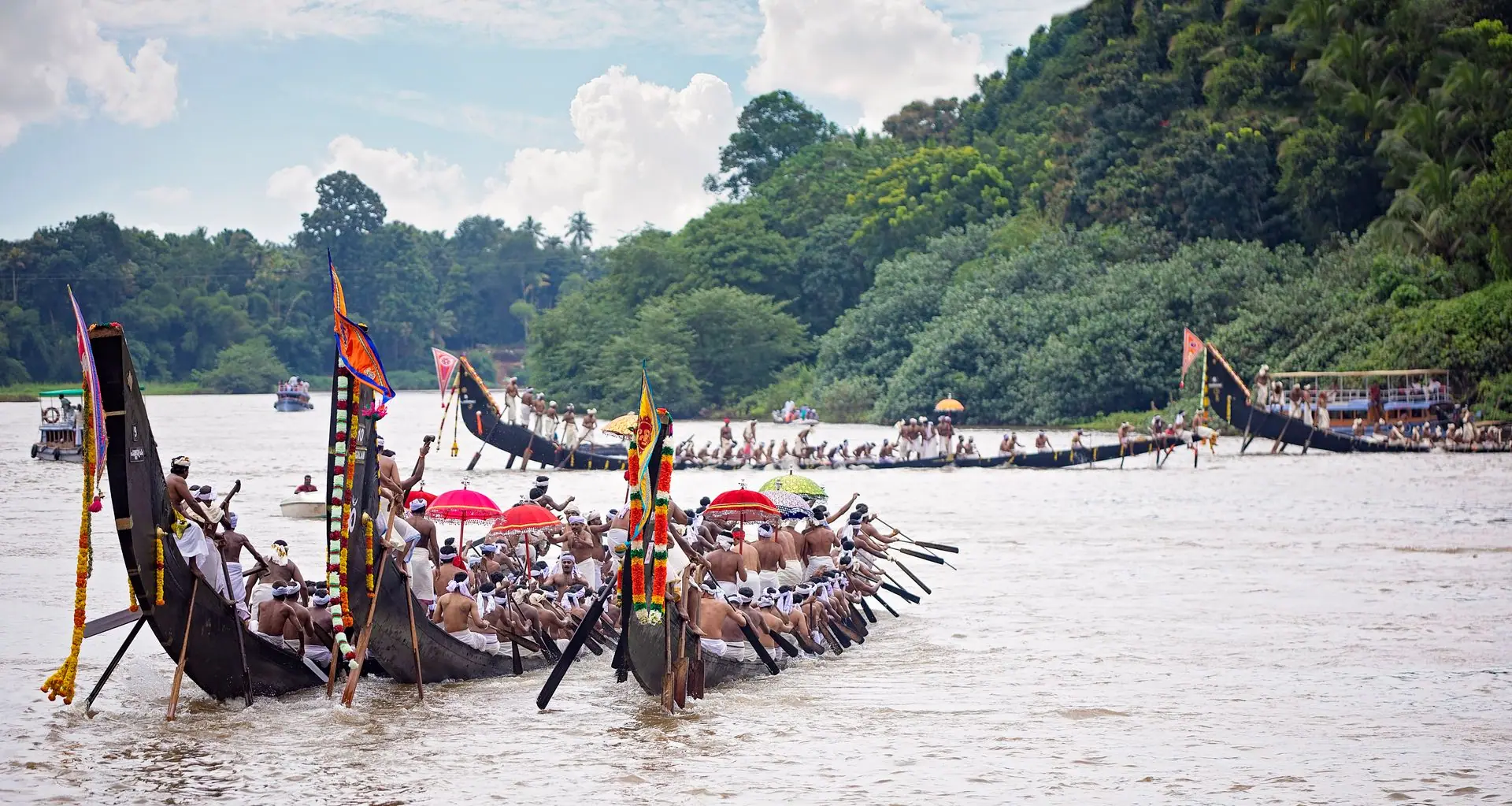 Exciting snake boat race on Pampa River in Kerala, showcasing vibrant cultural tradition