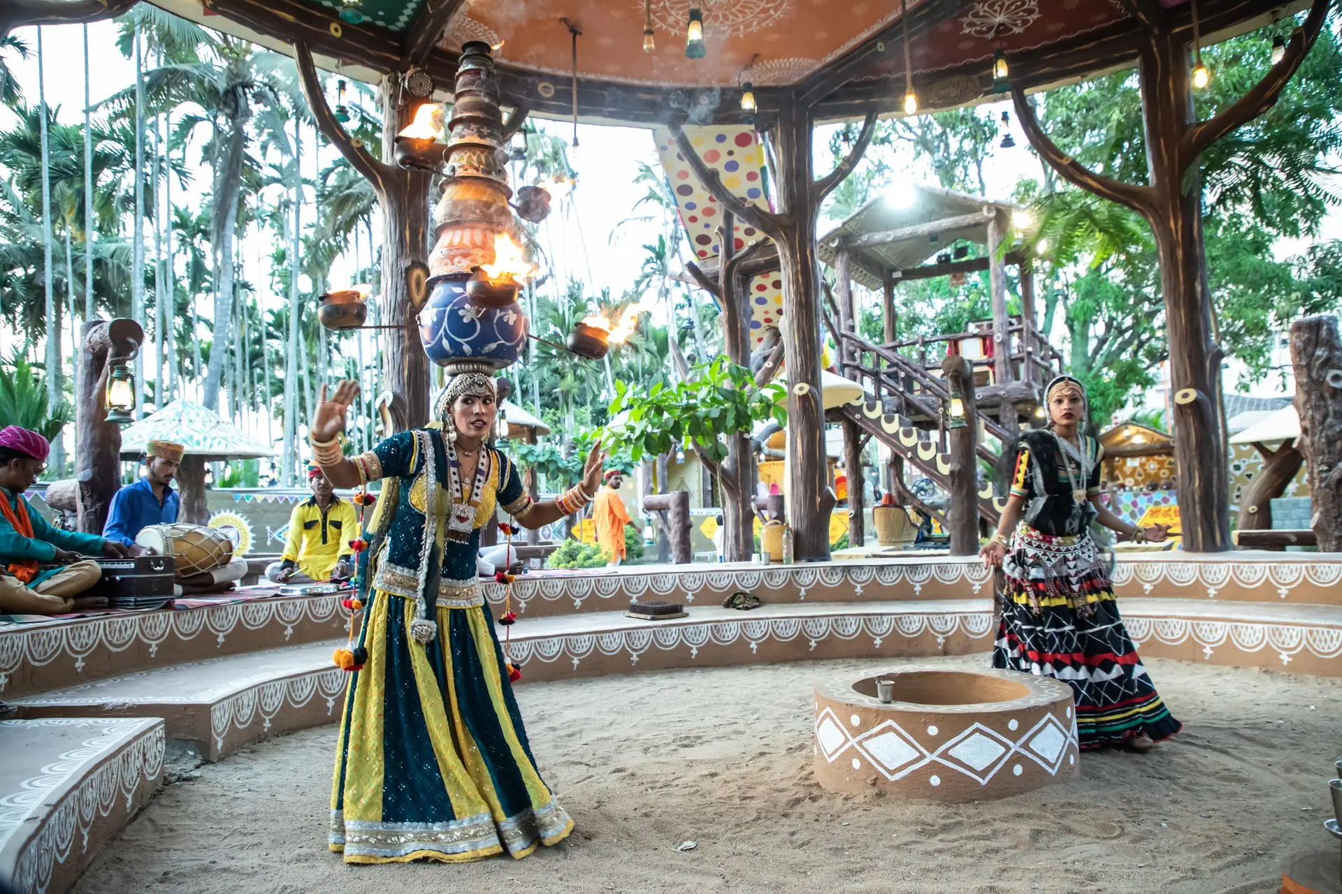 Vibrant Rajasthani dancers performing traditional folk dance in a cultural setting