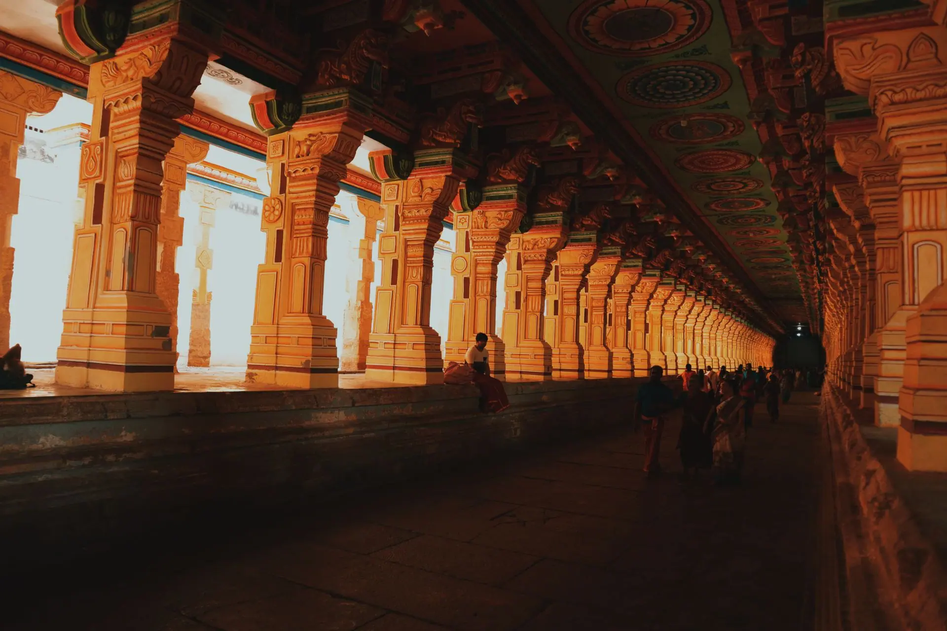 Intricately carved columns in the corridor of Ramanathaswamy Temple, capturing sacred Hindu architecture