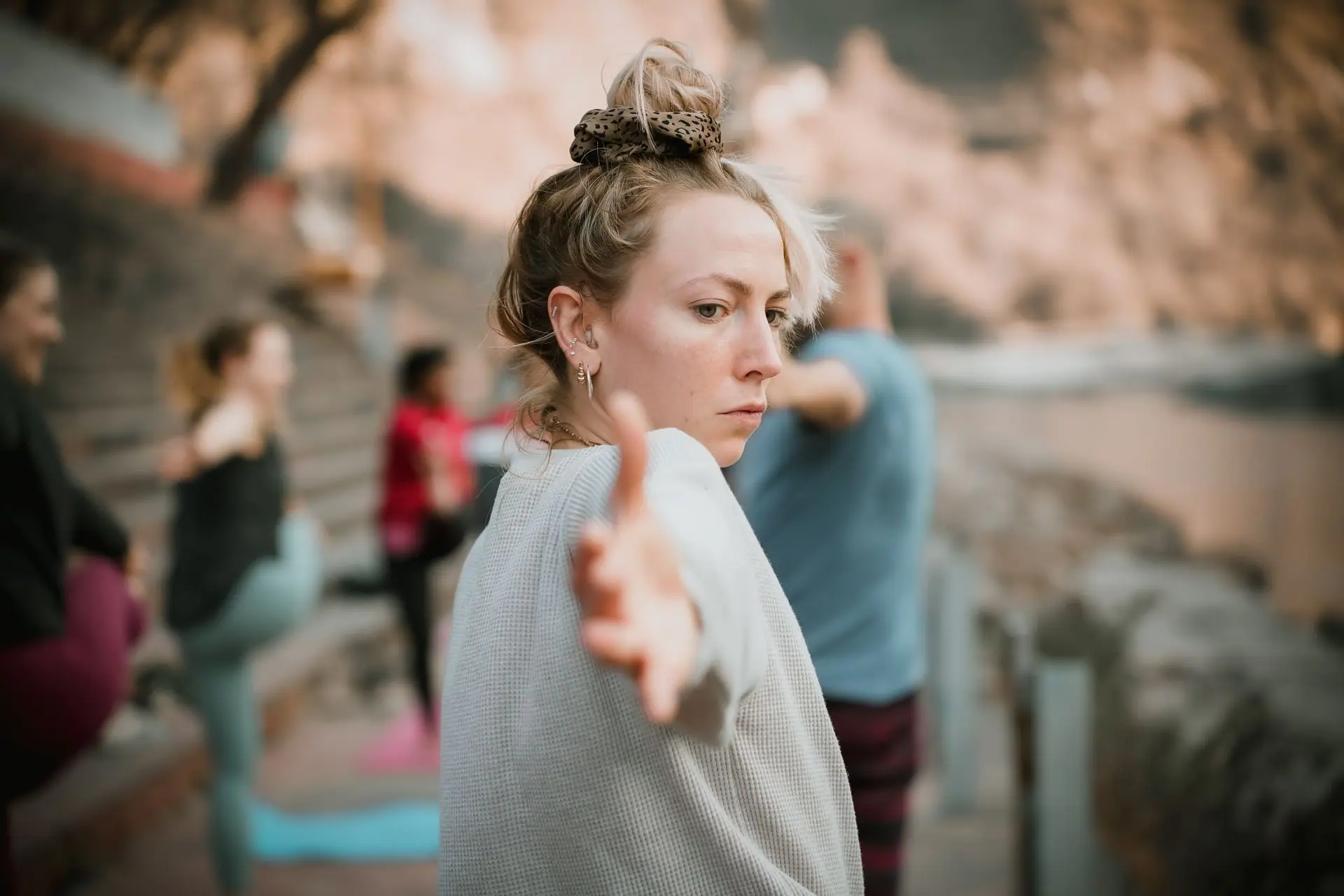 Woman practicing yoga outdoors in Rishikesh with a focus on flexibility and mindfulness