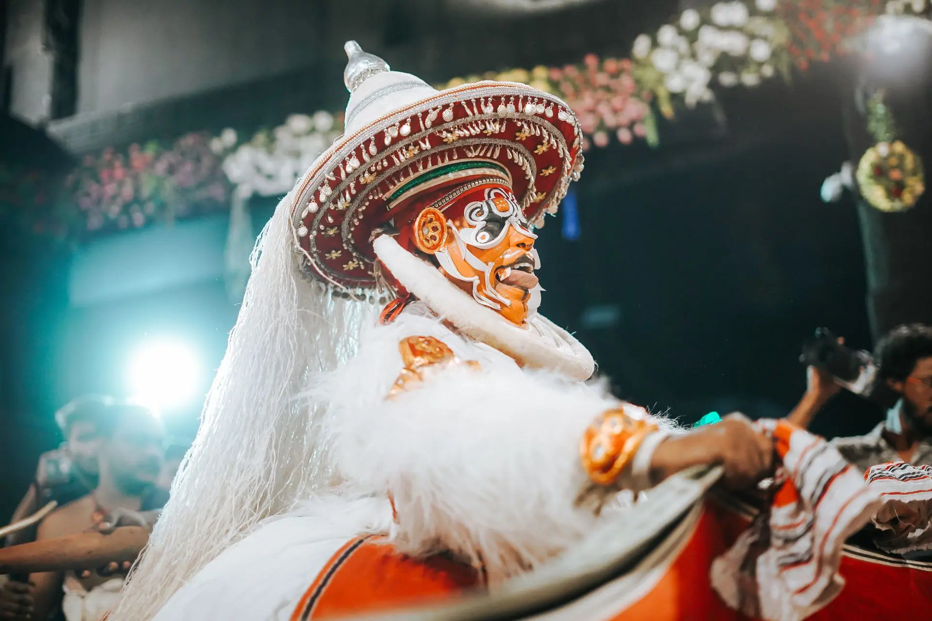 Captivating image of a Theyyam performer in traditional attire during a cultural event in Nagpur, India