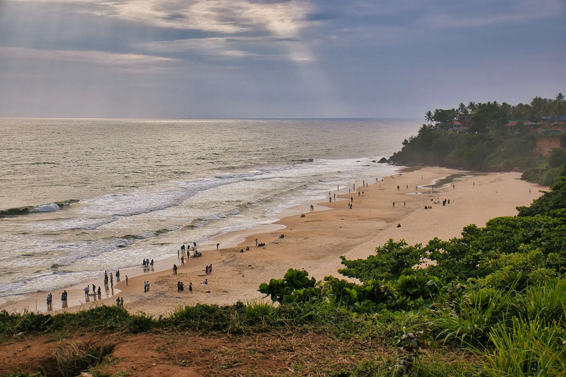 Relax and unwind with this scenic view of Varkala Beach in Kerala at sunset
