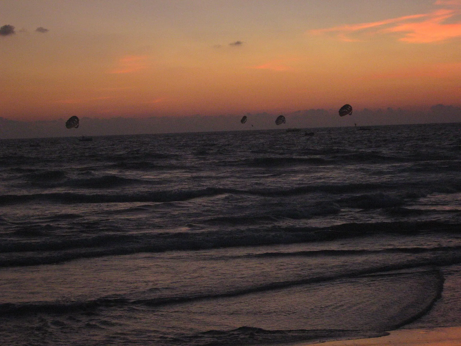 Parasailing during sunset