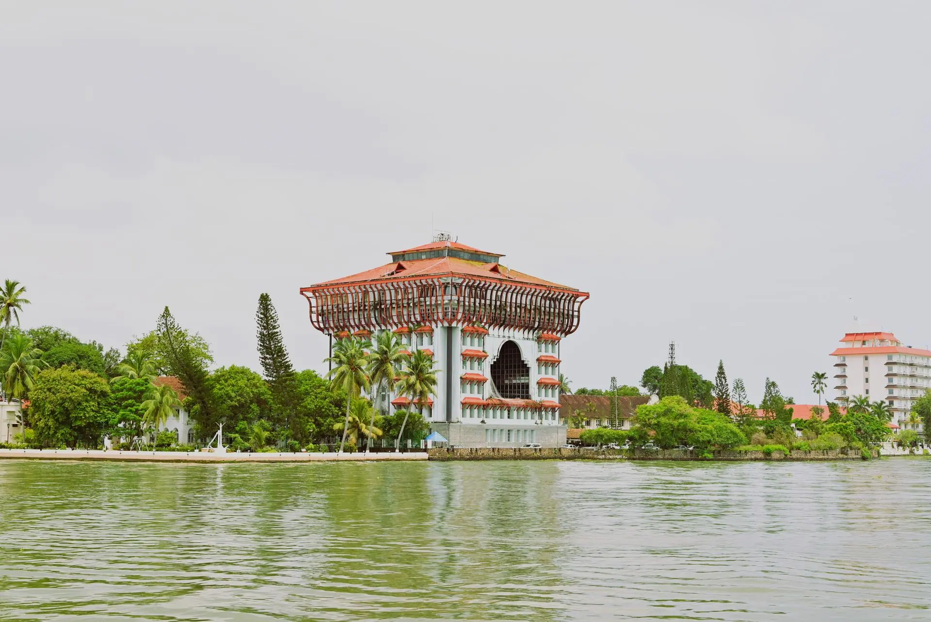 Stunning view of a landmark building in Kochi, Kerala, by a serene waterway