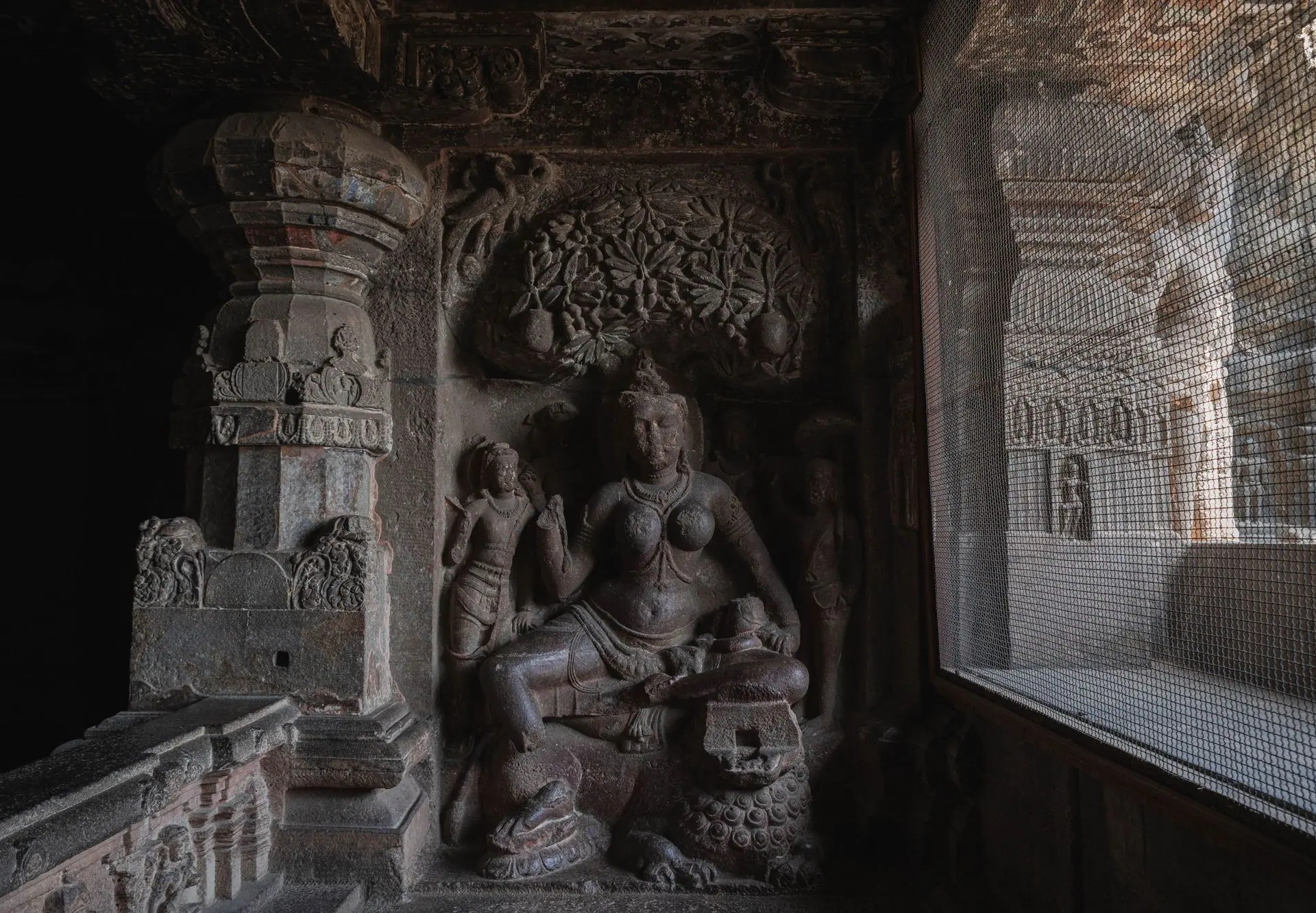 Detailed stone sculpture showcasing ancient Indian art at Ellora Caves, Maharashtra