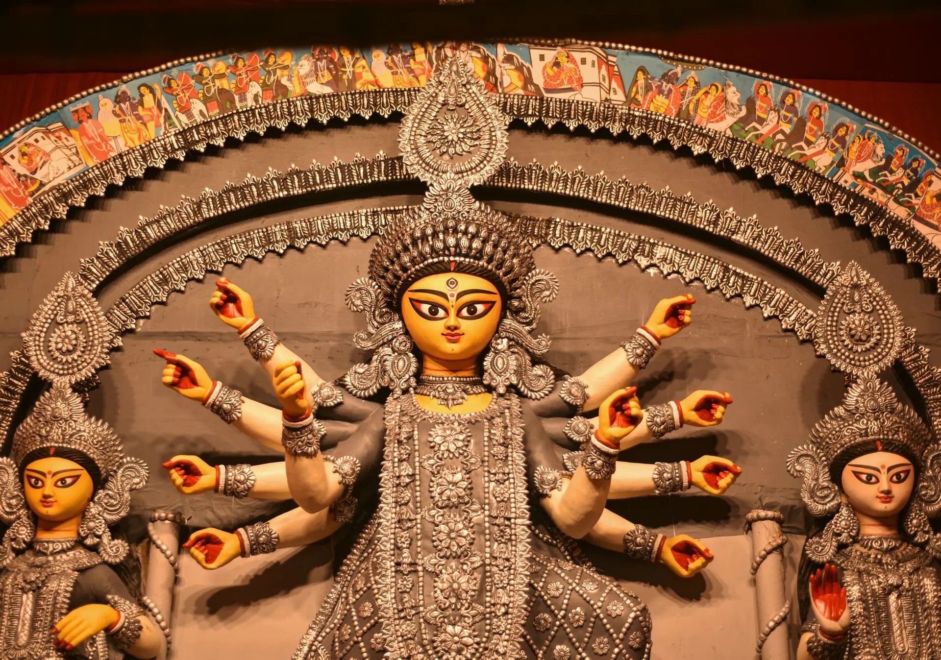 Detailed view of a Durga Puja idol showcasing traditional craftsmanship and vibrant colors