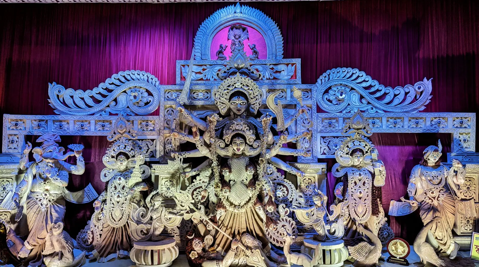 Beautifully ornamented Durga Puja idol displayed in Kolkata, showcasing traditional craftsmanship and religious significance