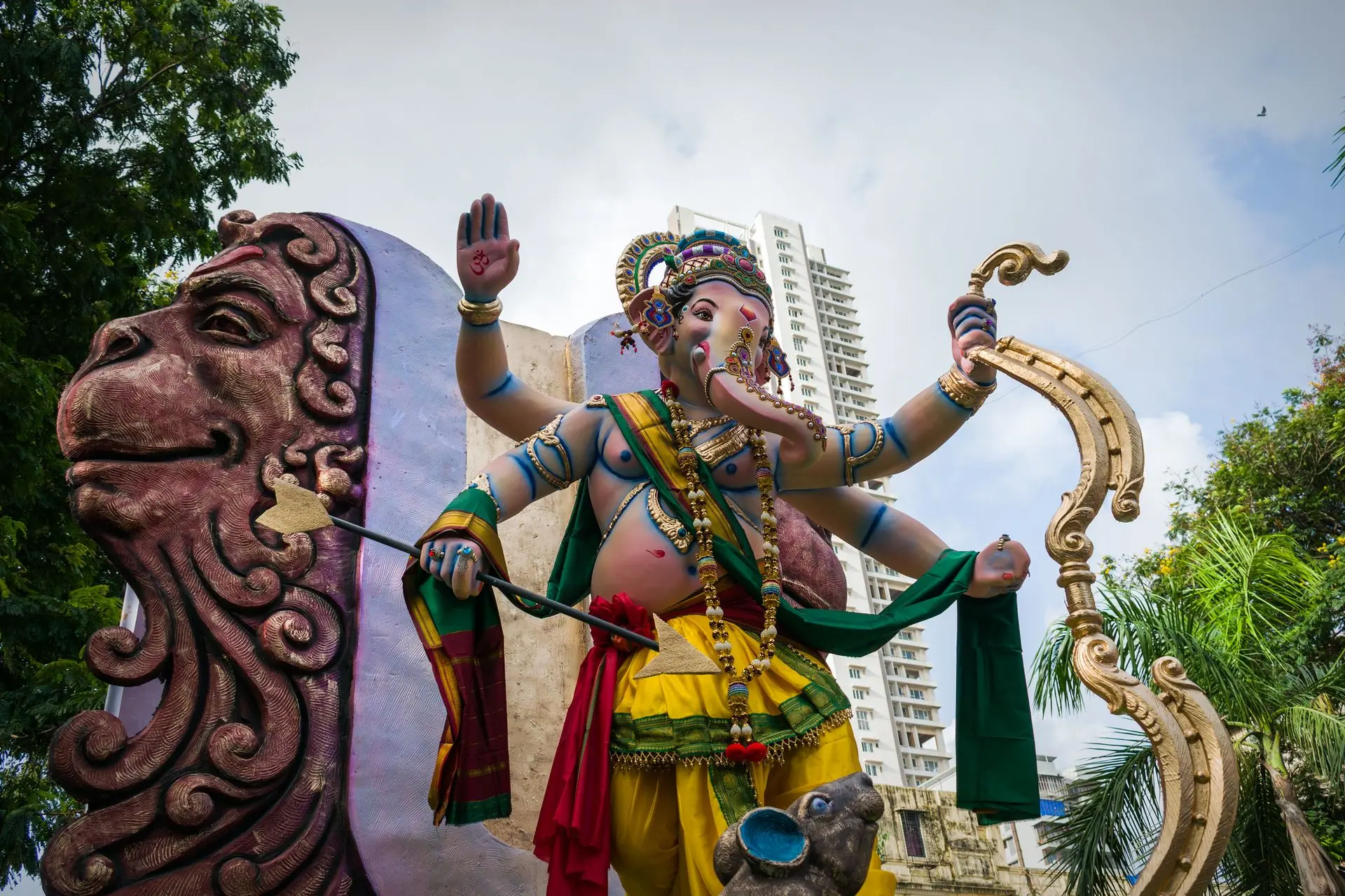Colorful statue of Lord Ganesha in Mumbai, embodying Hindu religious art