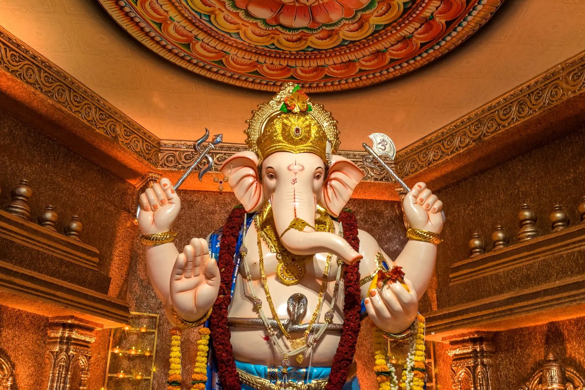 Decorative Ganesh idol in a Mumbai temple during Ganesh Chaturthi, showcasing vibrant cultural artistry