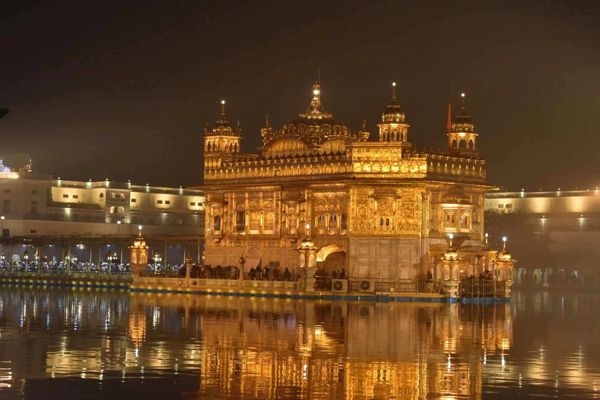Stunning view of the Golden Temple illuminated at night in Amritsar, India