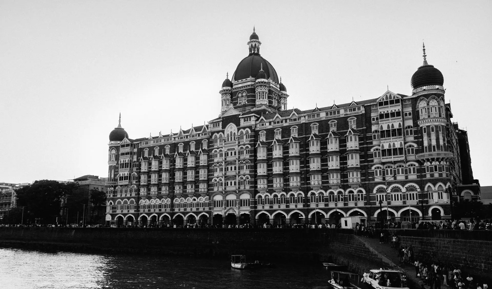 Black and white image of the Taj Mahal Palace Hotel, Mumbai's architectural landmark