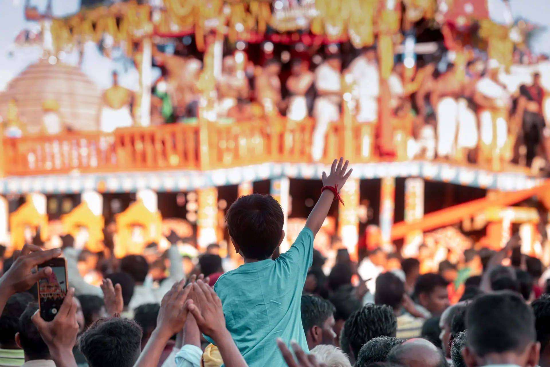 A joyful festival scene in Puri, India showing a lively gathering with colorful decorations and cultural performances
