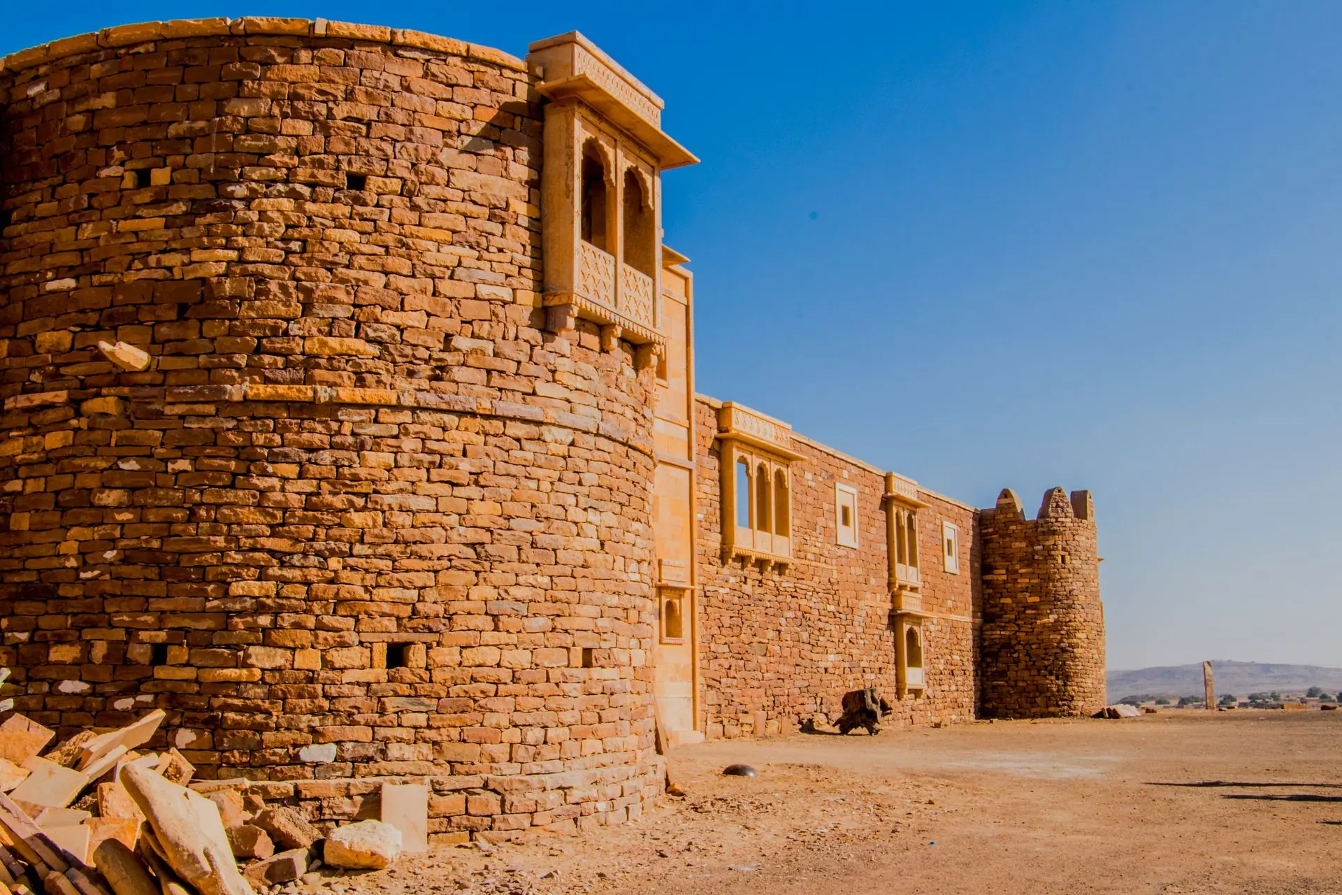 Capture of the ancient Khaba Fort amidst the arid landscapes of Jaisalmer, India