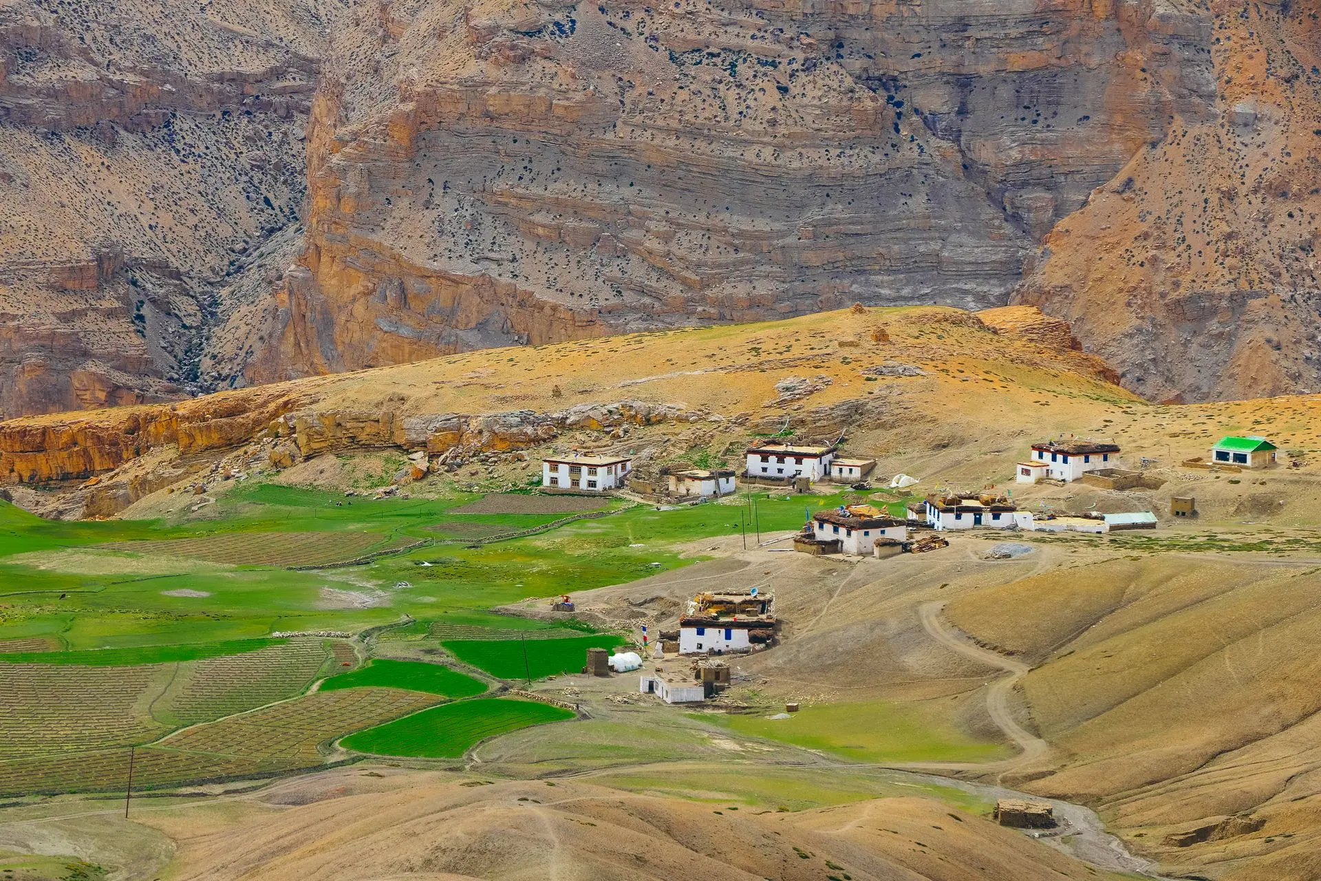 Idyllic view of the rural Langza village amidst mountainous terrain in Spiti Valley, India