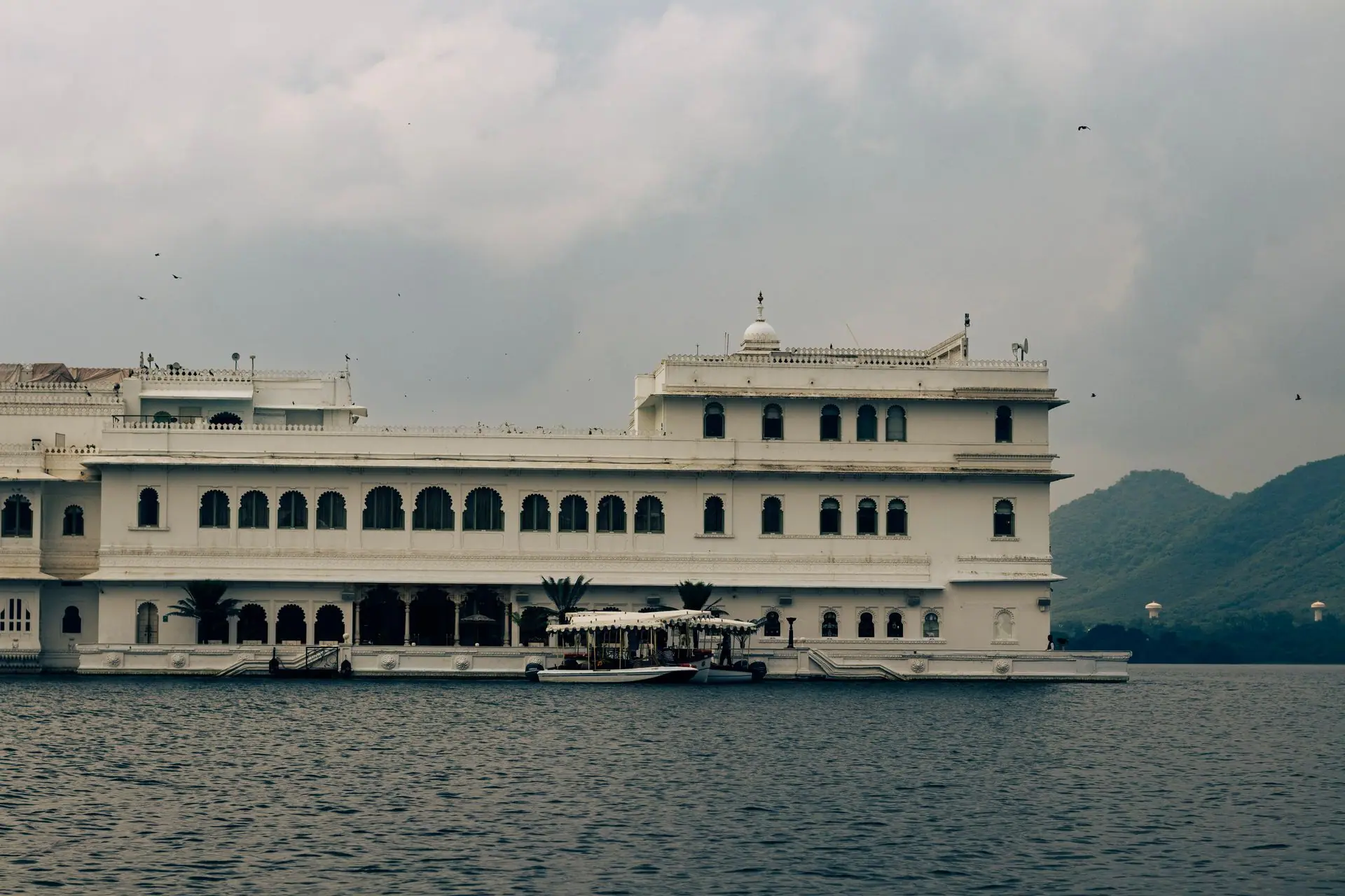 Scenic view of Lake Palace in Udaipur, Rajasthan, highlighting its stunning architecture on Lake Pichola
