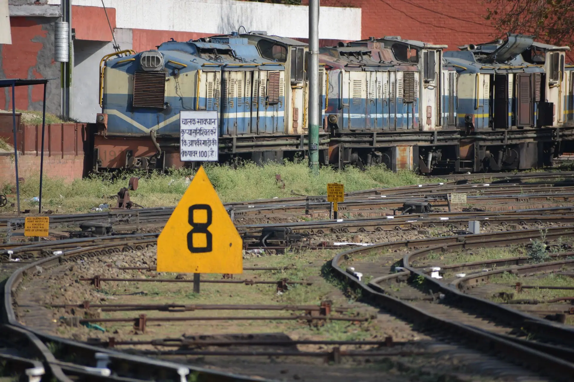 Historic Kalka Shimla Railway yard showcasing classic trains on curved rail tracks, India